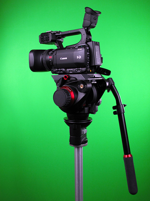 The Canon XF-100 atop the Manfrotto 504HD atop the Manfrotto 325N atop the Bogen 3020, all shot in front of the eefx green screen. A Manfrotto MVT546GB soon to follow. (Click image to up-rez.)
